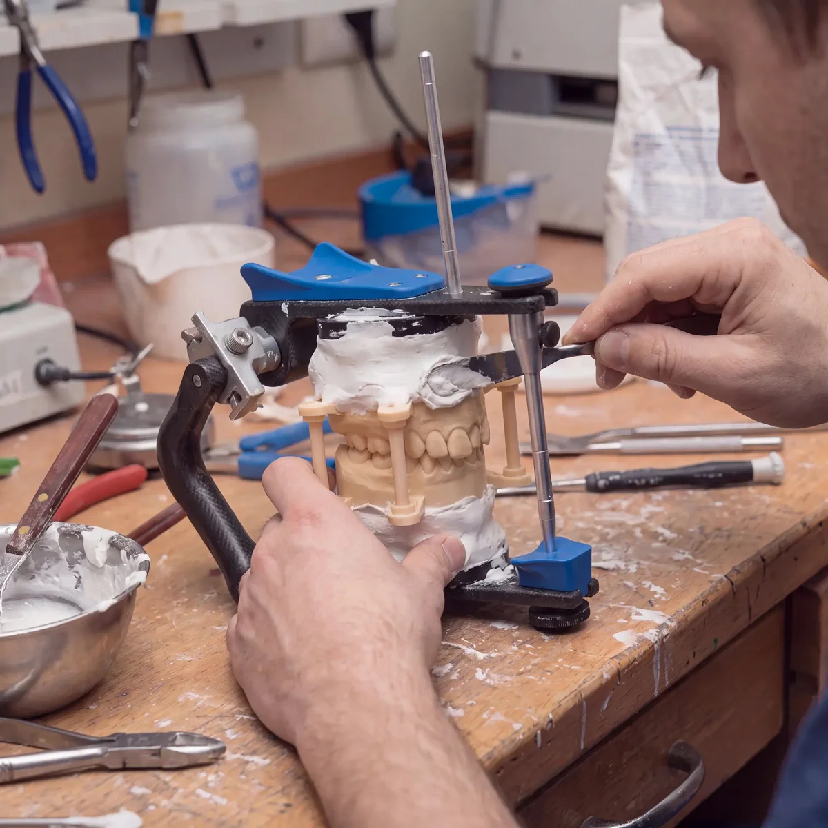 Plaster mounting on the bench — mess, wait, guesswork